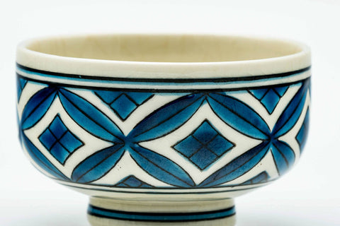 Close-up of the blue geometric lattice pattern and the interior.