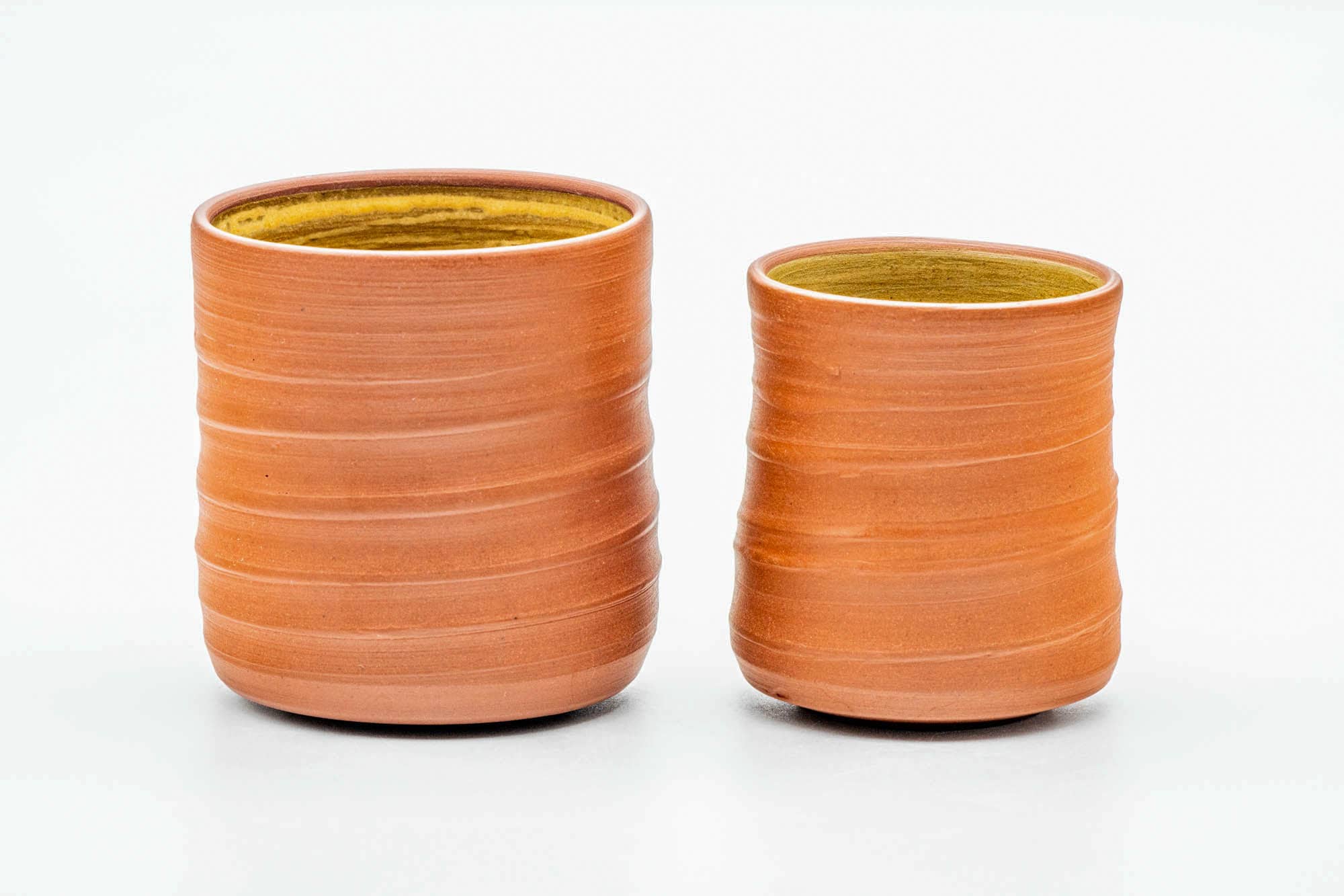 Japanese Teacups - Pair of Spiraling Orange Yellow Hakeme Meoto Yunomi