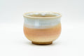 Japanese Teacup - Tsubaki Kiln Beige White Glazed Hagi-yaki Yunomi - 140ml - front view of the teacup