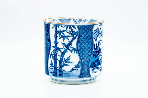 Japanese Mizusashi - Bamboo Geometric Patterned Arita-yaki Fresh Water Jar - 1200ml - side view with the lid in place showing the blue-and-white bamboo and geometric pattern