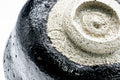 Close-up of the rough cream spiralled foot