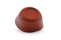 Tezumi — Japanese Katakuchi - Mountainous Red Shudei Tokoname-yaki Water Cooler - 120ml — closeup of the glaze