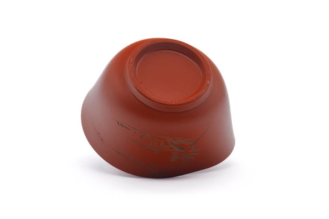 Tezumi — Japanese Katakuchi - Mountainous Red Shudei Tokoname-yaki Water Cooler - 120ml — closeup of the glaze