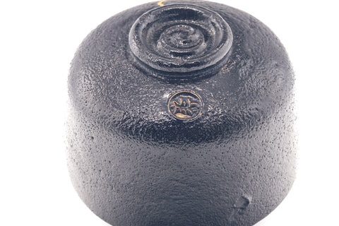 The bowl inverted to show the foot and base spiral.