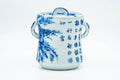 Japanese Mizusashi - Blue Kanji Mountainous Porcelain Fresh Water Container - 1100ml - front view of the blue-and-white lidded water container