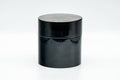 Tezumi — Japanese Chazutsu - Red Blossoms Black Plastic Tea Canister - 300ml — lid removed beside the body