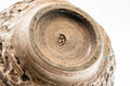 Underside of a guinomi showing the unglazed clay foot