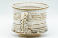 Tezumi — Japanese Teacup - Carved Exterior White Glazed Rear-Handled Ushirode Yunomi - 110ml — inverted showing the foot ring