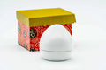 Rear view of the egg-shaped kogo showing the gold-glazed domed top.