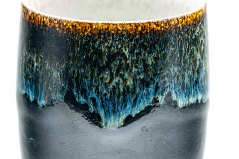Tezumi — Japanese Teacup - Jet Black Blue Hare's Fur Drip-Glazed Yunomi - 150ml — tipped to show the interior
