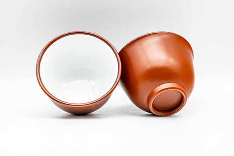 Japanese Teacups - Pair of White Inner-Glazed Tokoname-yaki Guinomi - 55ml - one cup upright showing the white glazed interior beside an inverted cup showing its base