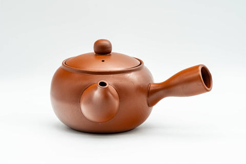 Japanese Tea Set - Bamboo Engraved Tokoname-yaki Debeso Kyusu Teapot with 4 Yunomi Teacups - side view showing the side handle and engraved bamboo