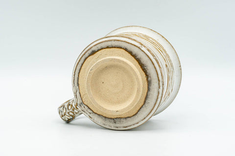 Tezumi — Japanese Teacup - Carved Exterior White Glazed Rear-Handled Ushirode Yunomi - 110ml — top-down view of the interior