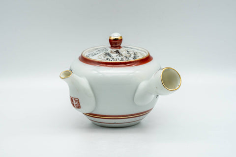 Tezumi — Japanese Tea Set - Geometric Script Kutani-yaki Debeso Kyusu Teapot with Katakuchi Water Cooler and 5 Yunomi Teacups — interior of the teapot showing the filter