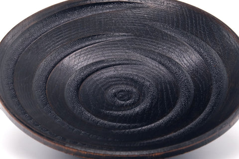 Tezumi — Japanese Chataku - Pair of Black Wooden Tea Saucers — three-quarter view