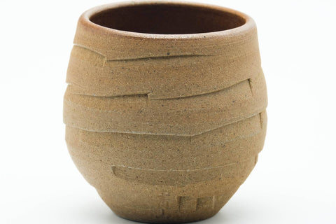 Tezumi — Japanese Teacup - Carved Spiraling Stoneware Yunomi - 120ml — tipped to show the interior