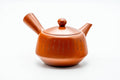 Japanese Kyusu - Calligraphy Engraved Red Shudei Tokoname-yaki Teapot - 350ml - three-quarter view of the smooth red shudei body, lid on and side handle to the right