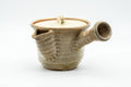 Tezumi — Japanese Kyusu - Beige Weathered Hagi-yaki Do-ake Teapot - 330ml — side view with the lid and side handle