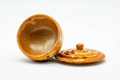 The yunomi with its lid removed, looking into the glazed interior.