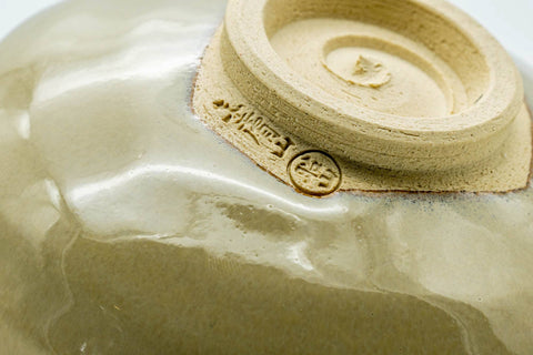 Closeup of the foot and base of the Akahada chawan with the maker's stamp