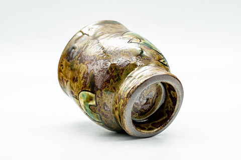 Cup tilted to show the foot and base.