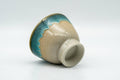 Tezumi — Japanese Teacup - Small Turquoise Drip-Glazed Agano-yaki Guinomi - 40ml — top-down view of the interior