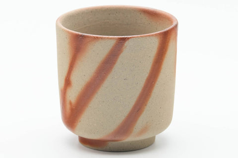 Tezumi — Japanese Teacup - Beige Orange Hidasuki Rice Straw Bizen-yaki Yunomi - 90ml — tipped to show the interior