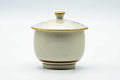 The lidded Kutani-yaki cup viewed from the plain reverse side.