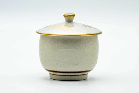 The lidded Kutani-yaki cup viewed from the plain reverse side.