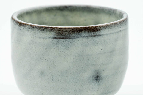 Close-up of the milky white crackle glaze.