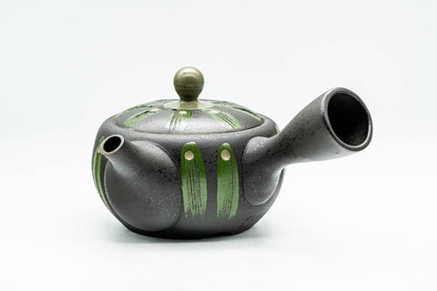 Front view showing the lid knob and the spout of the teapot.