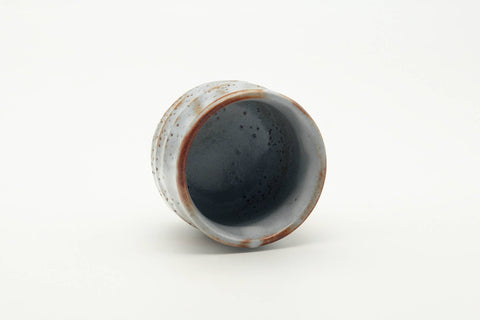 Tezumi — Japanese Teacup - Blue Orange Shino Glazed Mino-yaki Yunomi - 130ml — three-quarter view