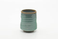 Tezumi — Japanese Teacup - Teal Speckled Thumb-Indented Yunomi - 180ml — top-down view of the interior