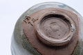 Tezumi — Japanese Matcha Bowl - Grey Glazed Wabi-Sabi Hantsutsu-gata Chawan - 300ml — inverted showing the foot ring