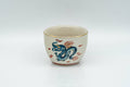Tezumi — Japanese Teacups - Set of 10 Uniquely Decorated Kutani-yaki Guinomi - 40ml — tipped to show the interior