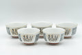 Tezumi — Japanese Tea Set - Geometric Script Kutani-yaki Debeso Kyusu Teapot with Katakuchi Water Cooler and 5 Yunomi Teacups — closeup of a single piece