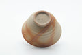 Tezumi — Japanese Teacup - Beige Orange Rice Straw Hidasuki Bizen-yaki Yunomi - 100ml — tipped to show the interior