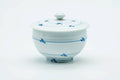 The lidded teacup from another angle, lid on.