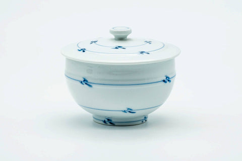 The lidded teacup from another angle, lid on.