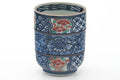 Tezumi — Japanese Teacup - Blue Floral Geometric Arita-yaki Yunomi - 245ml — tipped to show the interior