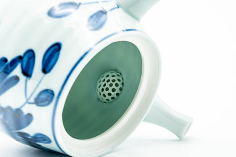 Japanese Kyusu - Blue Floral Arita-yaki Ceramic Filter Teapot - 400ml - interior view with the lid removed, showing the green-rimmed perforated ceramic filter and white interior