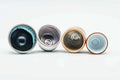 Overhead view of the four guinomi teacups revealing their varied glazed interiors.