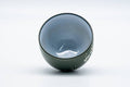 Tezumi — Japanese Teacup - Plum Blossom White Inner-Glazed Ryokudei Tokoname-yaki Yunomi - 140ml — three-quarter view