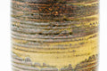 Closeup of the body surface showing the horizontal brushed glaze striations.