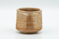 Tezumi — Japanese Teacup - Beige Drip-Glazed Hagi-yaki Yunomi - 70ml — front view from another angle