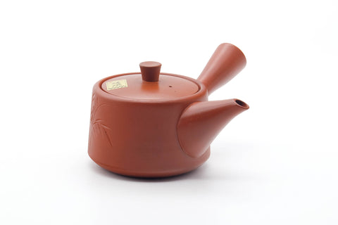 Tezumi — Japanese Tea Set - Bamboo Engraved Tokoname-yaki Kyusu Teapot with 5 Yunomi Teacups — the teapot in three-quarter view