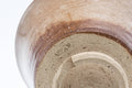 Tezumi — Japanese Teacup - Beige Milky Glazed Hagi-yaki Yunomi - 90ml — tipped to show the interior