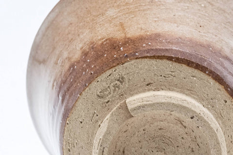 Tezumi — Japanese Teacup - Beige Milky Glazed Hagi-yaki Yunomi - 90ml — tipped to show the interior