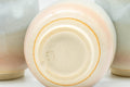 Japanese Teacups - Set of 4 Tsubaki Kiln Hagi-yaki Yunomi - 90ml - closeup of the undersides showing the unglazed foot rings