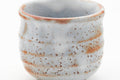 Tezumi — Japanese Teacup - Blue Orange Shino Glazed Mino-yaki Yunomi - 130ml — tipped to show the interior
